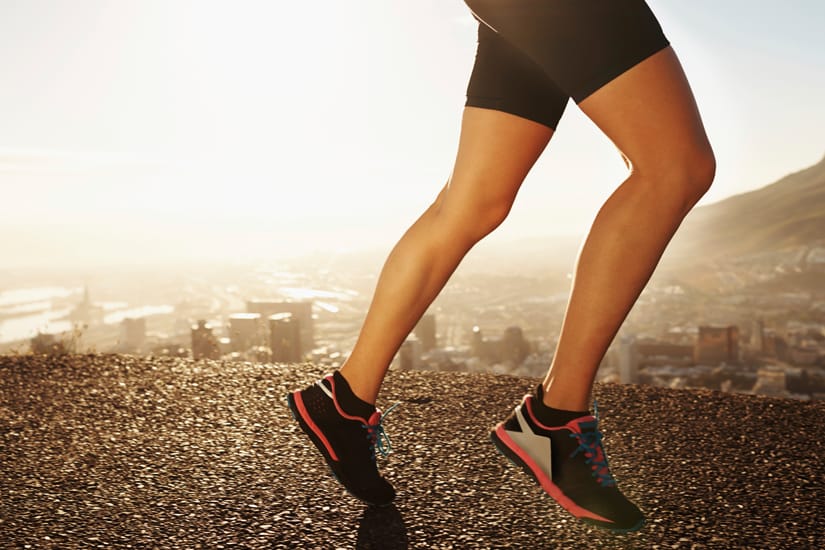 Man running outdoors with training shoe